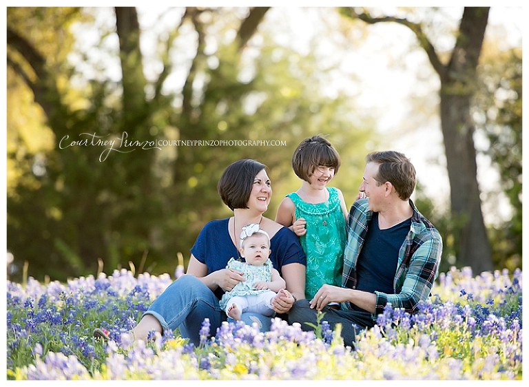 austin family bluebonnet photographer child flower field